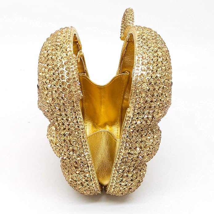 Gold teddy bear-shaped Crystal Clutch with rhinestones opened against a white background